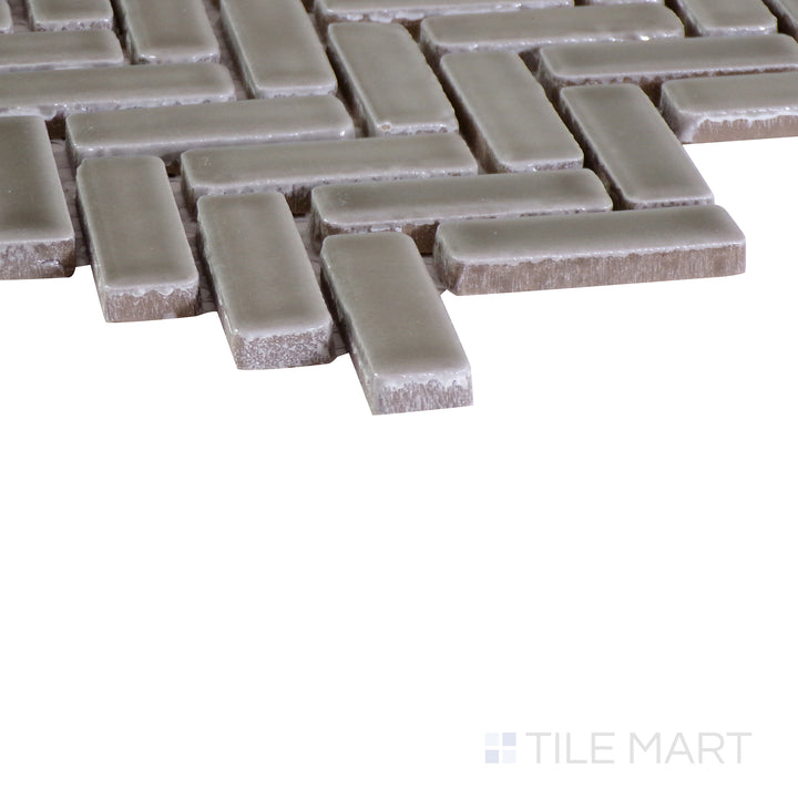 An angled shot of the tan and beige tile, revealing its polished surface and natural color variation.