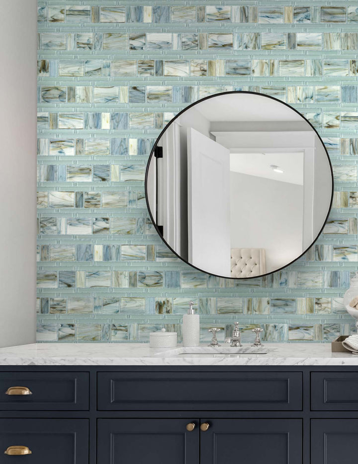 A modern room with indigo blue tiles from the Boutique Sleek series, creating a bold statement against minimalist decor.