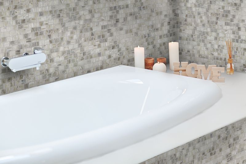 Striking indigo blue tiles from the Boutique Sleek series add contrast and character to this sleek, contemporary room.