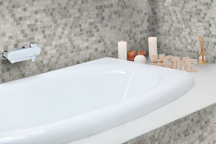 Striking indigo blue tiles from the Boutique Sleek series add contrast and character to this sleek, contemporary room.