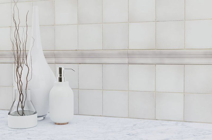 An elegant space with glossy white tiles from the Salt Glossy series, reflecting natural light beautifully.