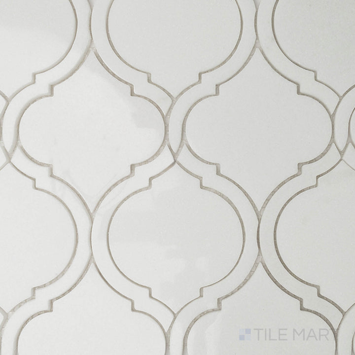 A beige tile with intricate tonal patterns, accented by a matte finish that adds understated elegance to any space.