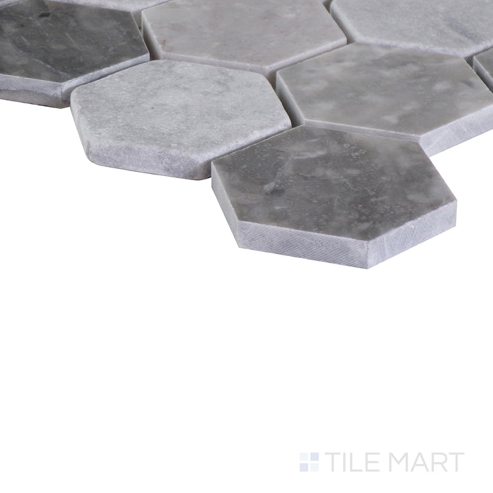 An angled perspective of the glossy white tile from the Salt Glossy series, reflecting light to enhance its sleek appearance.