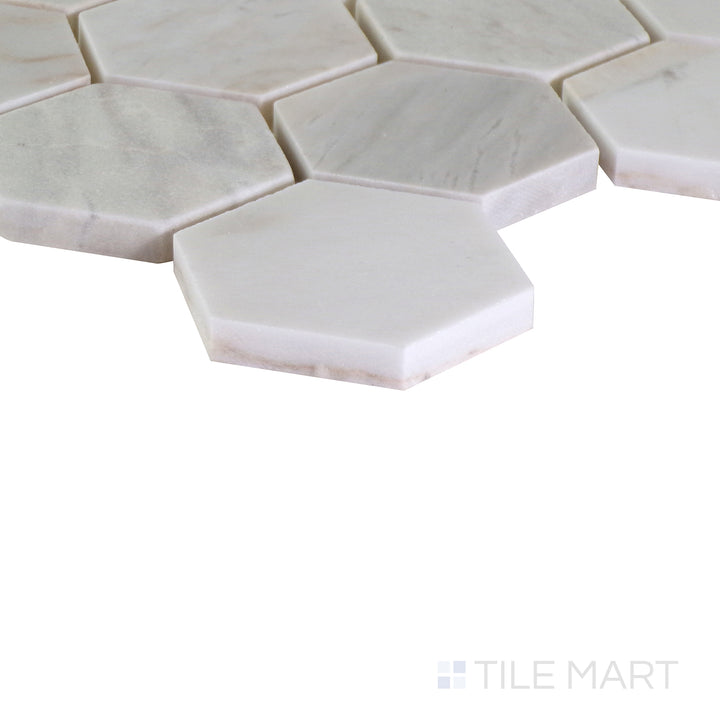 A close-up angled view of the matte white tile from the Salt Matte series, highlighting its subtle texture and smooth finish.