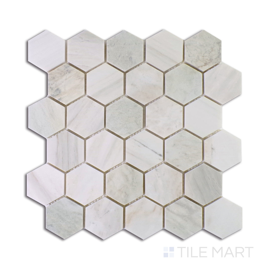 A matte-finished white tile with subtle textural nuances, ideal for creating a clean and minimalist aesthetic.