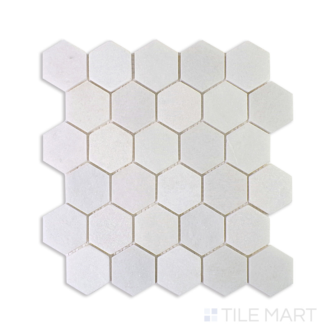 A tan and beige ceramic tile with a sleek, polished finish, perfect for warm and inviting living spaces.