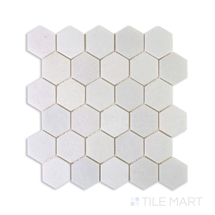 A tan and beige ceramic tile with a sleek, polished finish, perfect for warm and inviting living spaces.