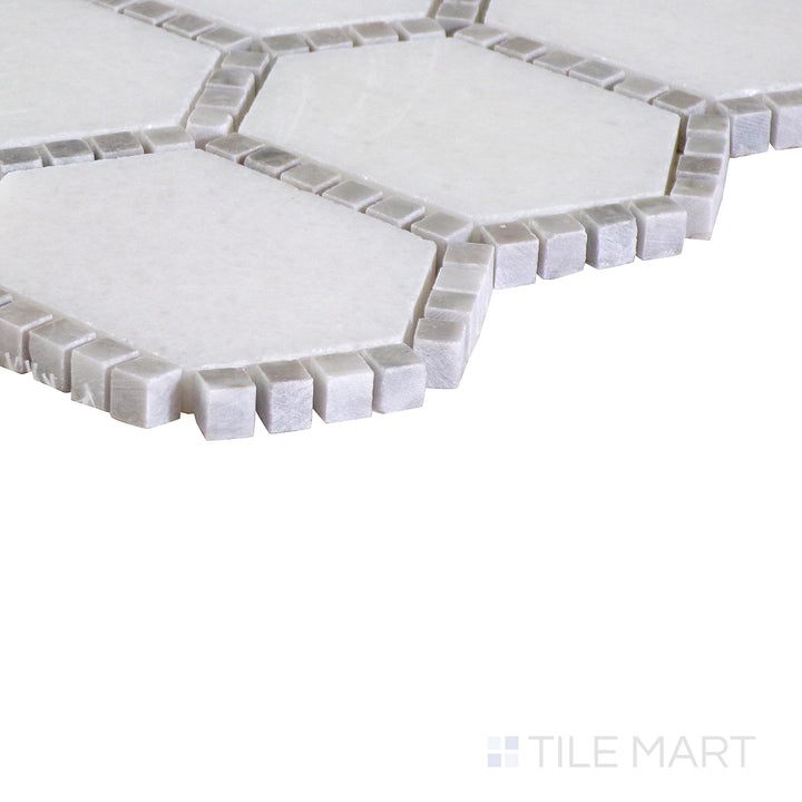 The indigo blue tile from the Boutique Sleek series, captured from an angle to emphasize its striking color and matte finish.