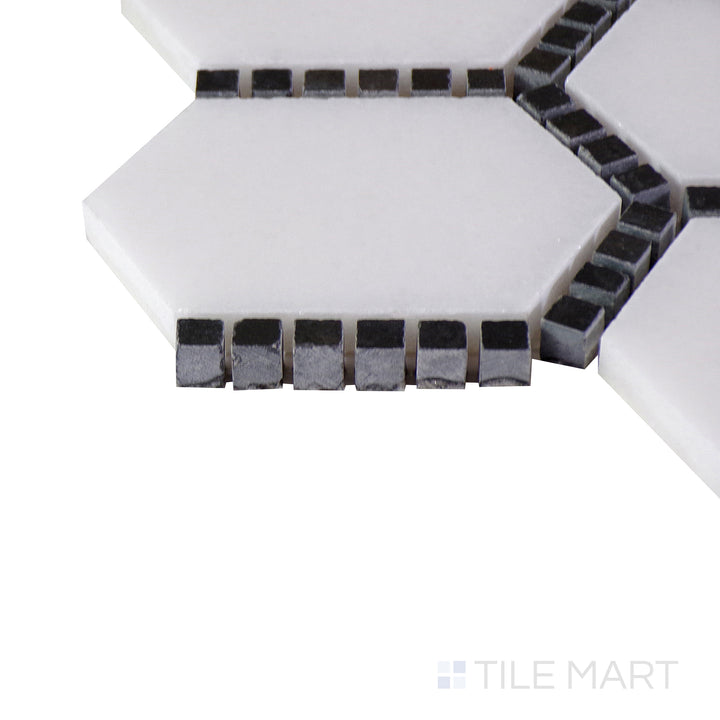 A close-up of the matte white tile's corner, showing its refined edges and robust material thickness.