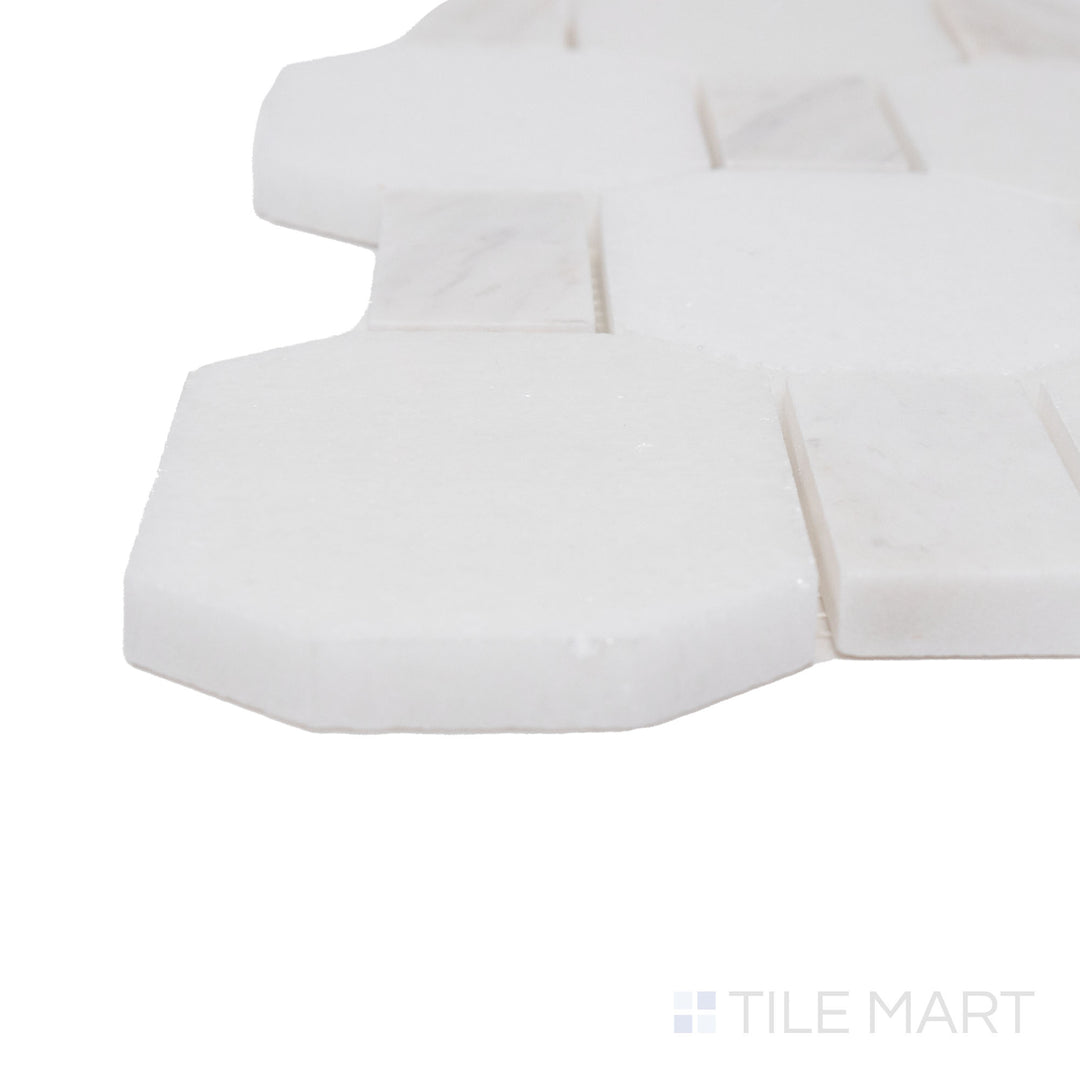 Corner shot of the beige and tan ceramic tile from the Boutique Sleek series, highlighting its material composition and slim profile.