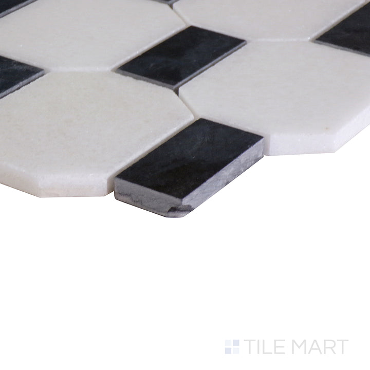 An angled view of the indigo blue tile from the Boutique Sleek series, emphasizing its glossy finish and bold color.