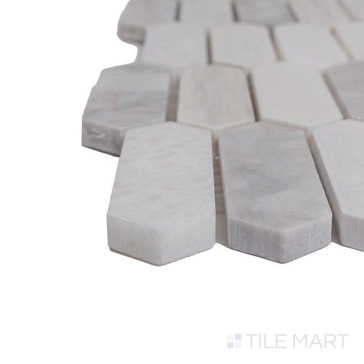 A detailed corner view of the indigo blue tile, revealing its solid construction and substantial thickness.