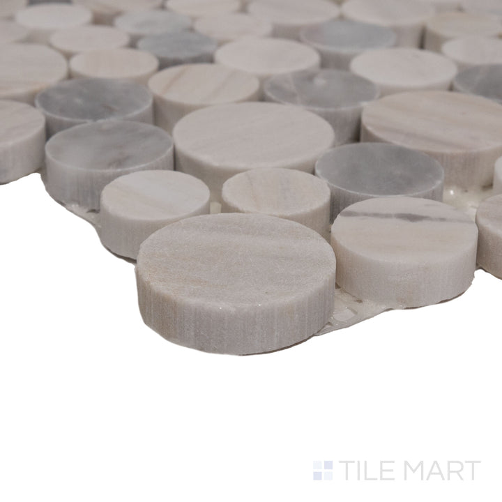 An angled view highlighting the dark gray tile's sleek surface and polished texture, adding depth and sophistication.