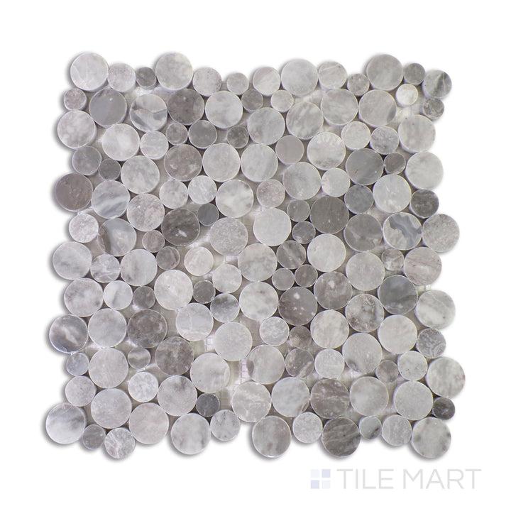 A beige tile with intricate tonal patterns, accented by a matte finish that adds understated elegance to any space.