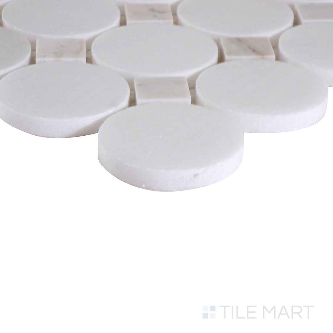 Angled shot showcasing the beige and tan ceramic tile from the Boutique Sleek series, highlighting its smooth surface and refined texture.