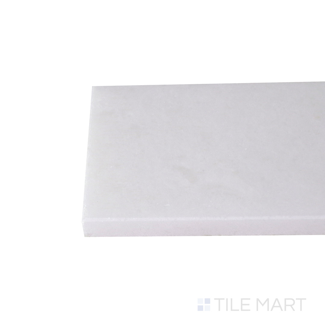 Corner shot of the tan and beige tile, emphasizing its thickness and high-quality ceramic material.