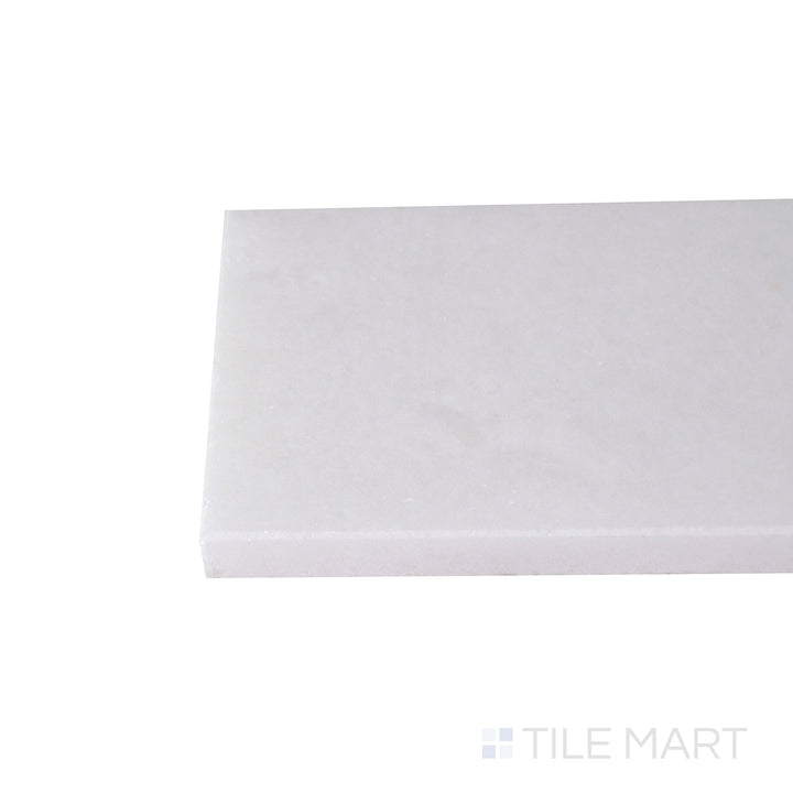 Corner shot of the tan and beige tile, emphasizing its thickness and high-quality ceramic material.