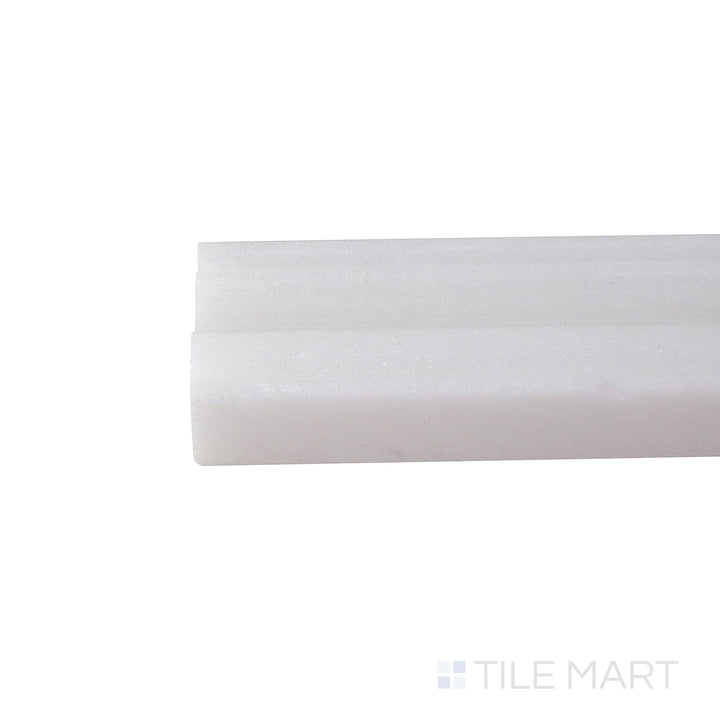 A detailed corner view of the indigo blue tile, revealing its solid construction and substantial thickness.