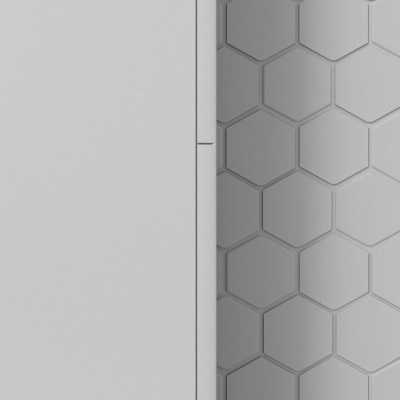 A refined interior featuring The Finish Line White 0.4x12 polished marble pencil, showcasing its crisp white tone and elegant polished surface.