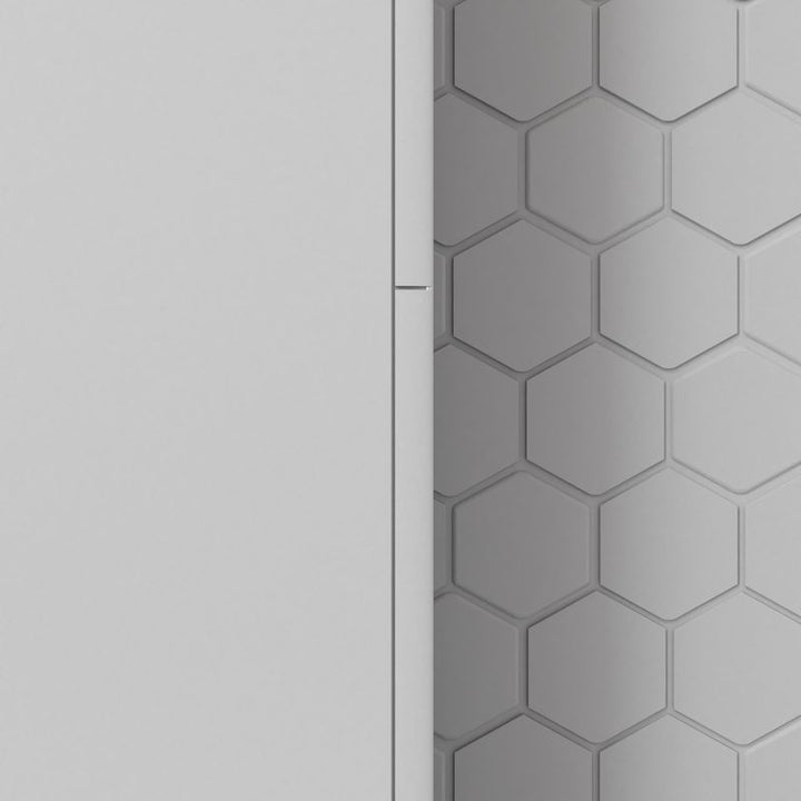 A refined interior featuring The Finish Line White 0.4x12 polished marble pencil, showcasing its crisp white tone and elegant polished surface.