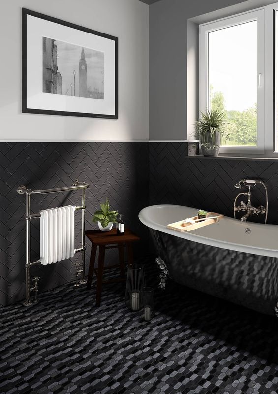 A modern room with indigo blue tiles from the Boutique Sleek series, creating a bold statement against minimalist decor.