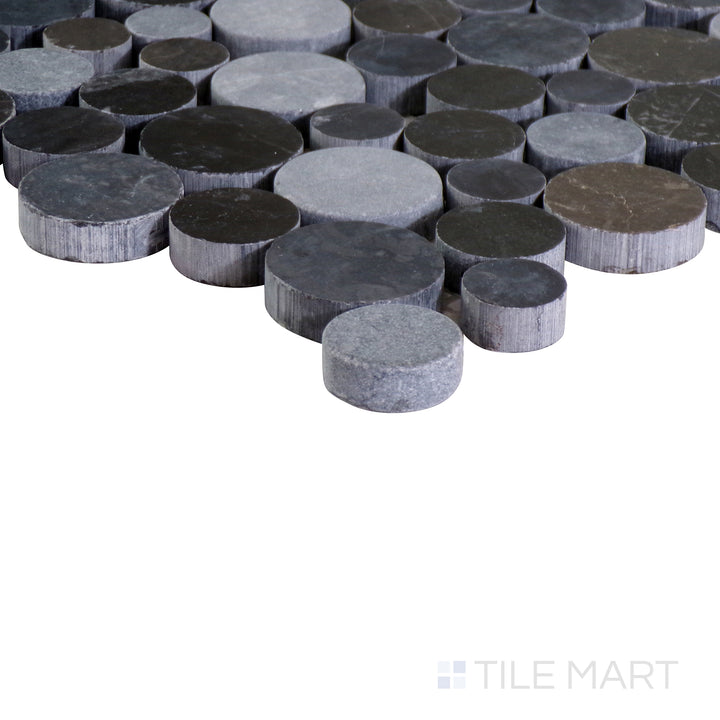 A dynamic angle capturing the dark gray and black tile from the Boutique Sleek series, showcasing its polished surface and modern appeal.