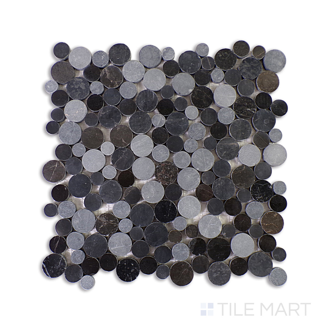 A dark gray and black ceramic tile, featuring a glossy surface that enhances depth and texture in contemporary spaces.