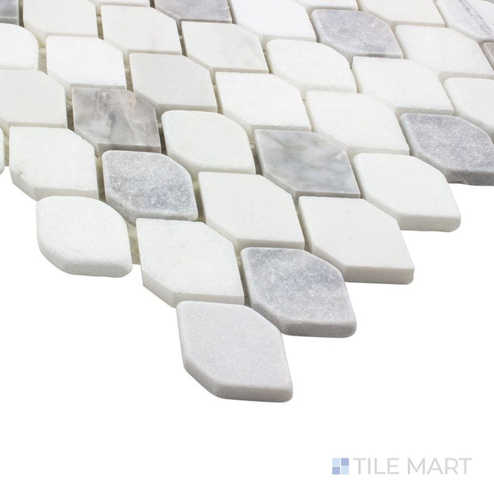 An angled view of the indigo blue tile from the Boutique Sleek series, emphasizing its glossy finish and bold color.