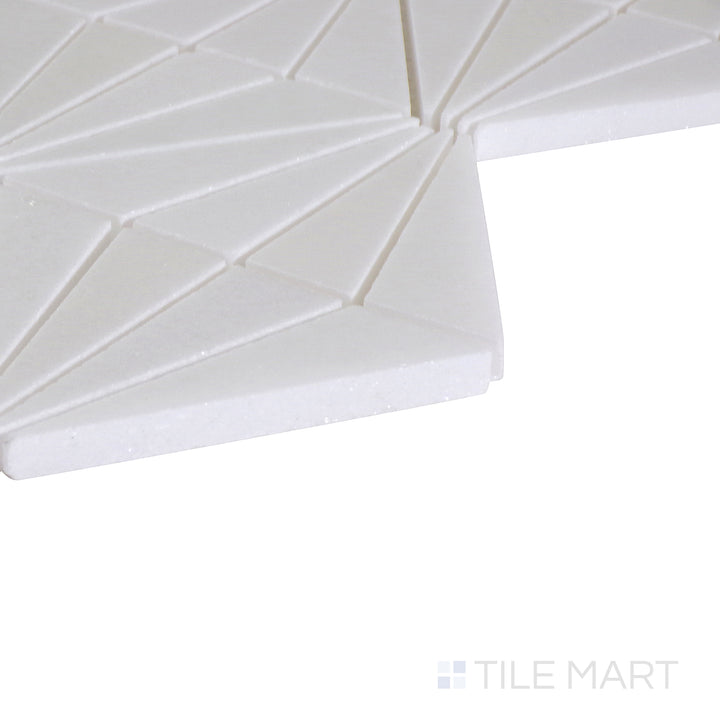 An angled shot of the tan and beige tile, revealing its polished surface and natural color variation.