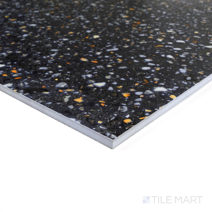 Corner close-up of Mystere Black 24x24 semi gloss porcelain tile showing deep tone and reflective glazed finish.