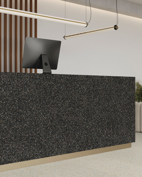 Mystere Black Semi Gloss Porcelain displayed in a sleek, contemporary space with reflective modern detail.