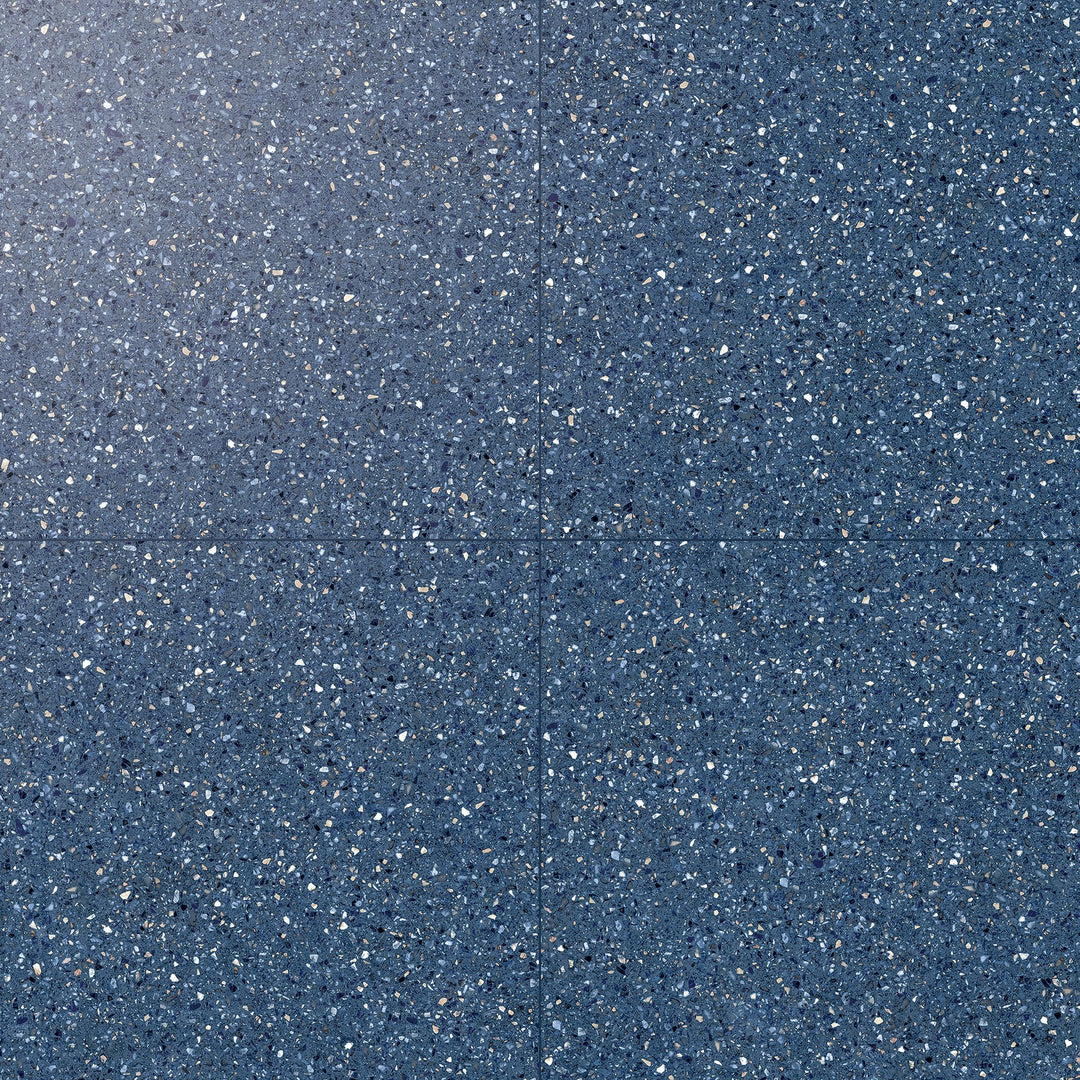 Overview of Mystere Blue 24x24 semi gloss porcelain tile, featuring a rich navy tone and a smooth, lightly polished appearance.