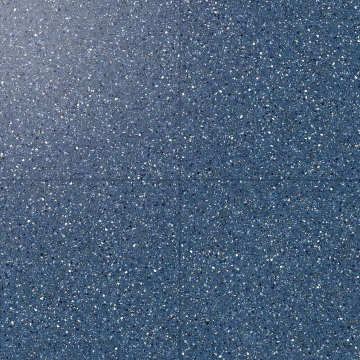 Overview of Mystere Blue 24x24 semi gloss porcelain tile, featuring a rich navy tone and a smooth, lightly polished appearance.