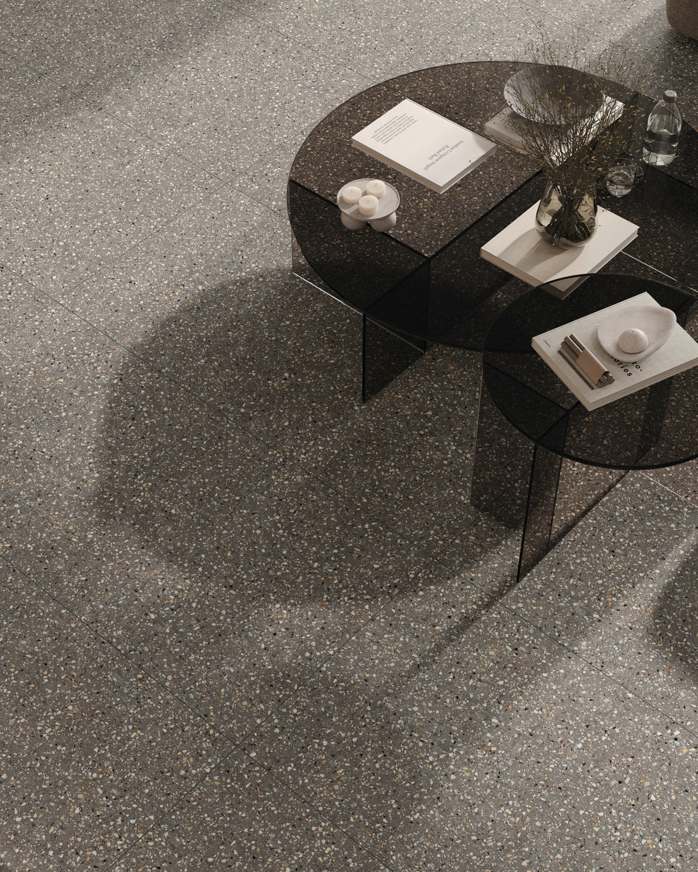 Mystere Dark Grey Semi Gloss Porcelain shown in a refined setting, emphasizing shadowed tone and luminous surface.