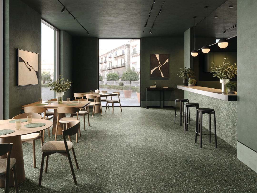 Mystere Green 24x24 semi gloss porcelain tile displayed with deep green hues and a subtle, elegant sheen.