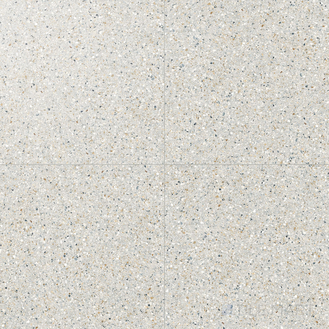 Overview of Mystere Linen 24x24 semi gloss porcelain tile, featuring soft beige tones and a clean, subtly glossy surface.