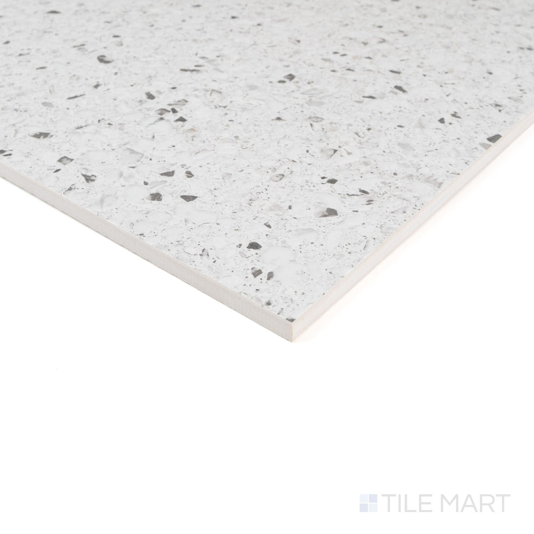 Corner close-up of Mystere White 24x24 semi gloss porcelain tile showing bright clean tone and sleek reflective surface.