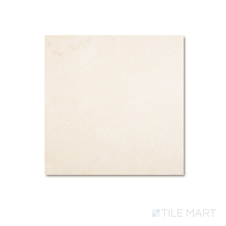 Overhead view of a 12x12 Palazzo Crema natural porcelain tile in warm ivory with a soft matte surface and subtle stone-like tone variation
