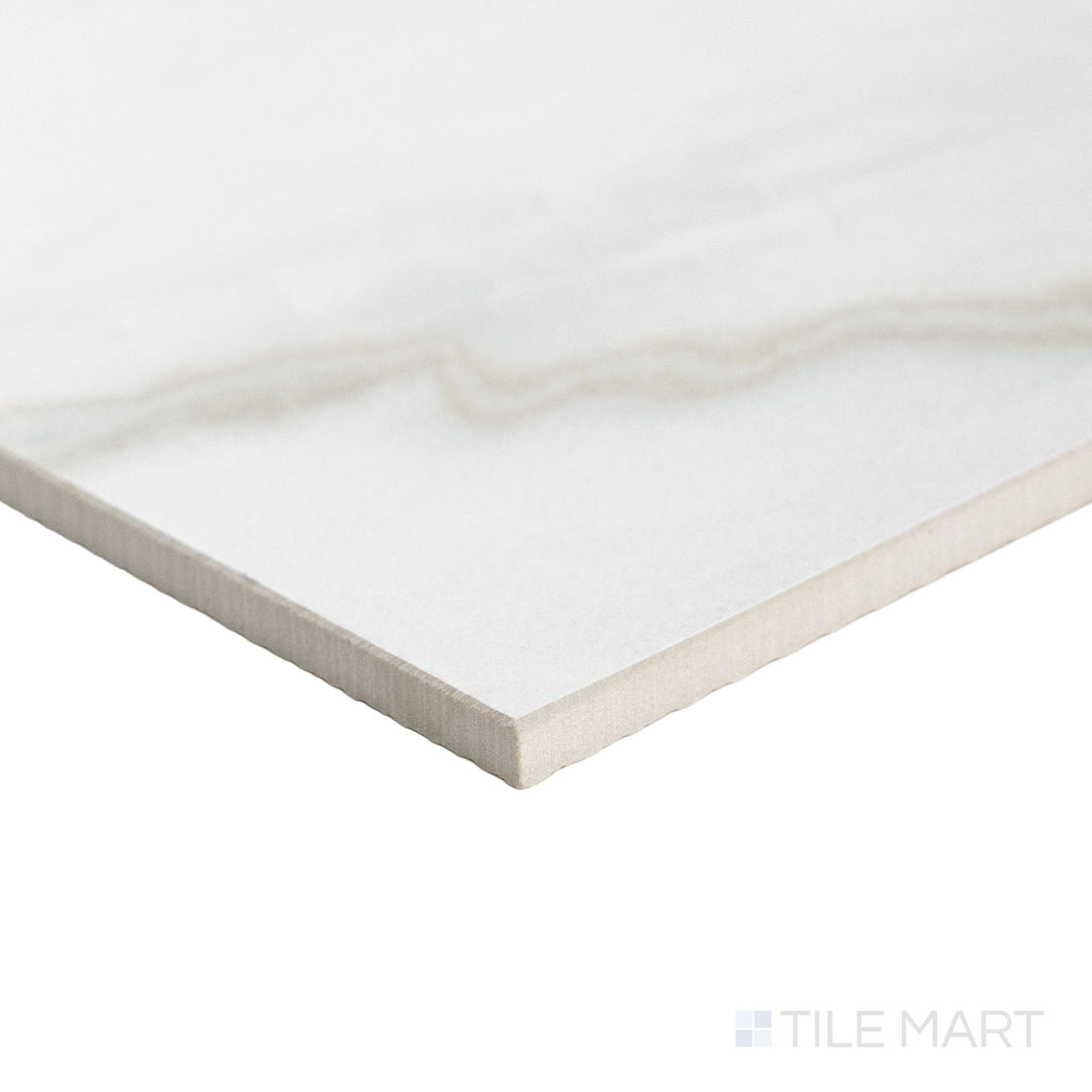 Corner shot of a 12x12 Palazzo Calacatta natural porcelain tile highlighting its sharp rectified edges and white marble-inspired matte surface