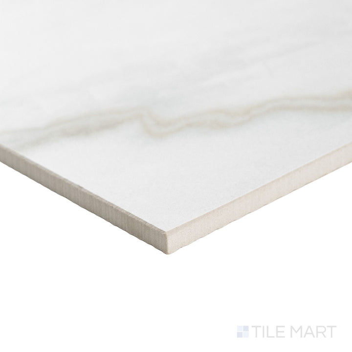 Corner shot of a 12x12 Palazzo Calacatta natural porcelain tile highlighting its sharp rectified edges and white marble-inspired matte surface