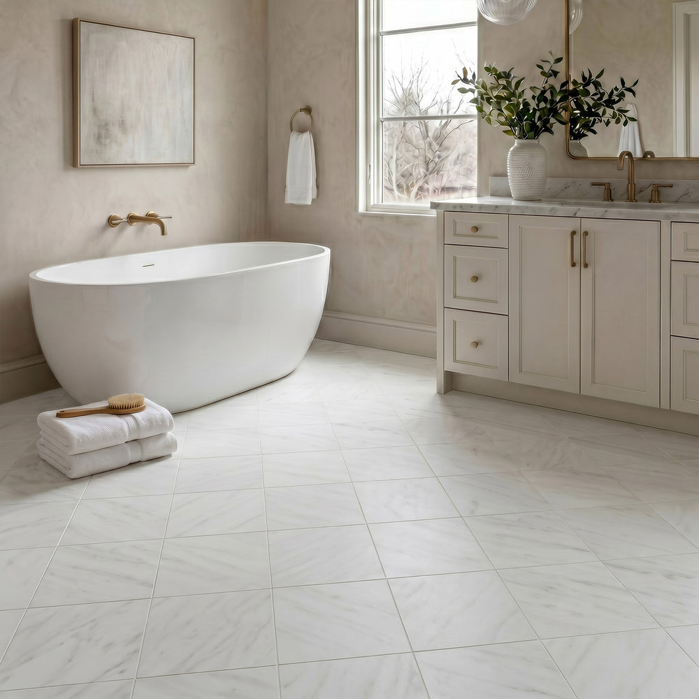 Palazzo Luce 12x12 natural porcelain rectified tile radiating a soft, airy brightness with its light tone and gently textured matte surface