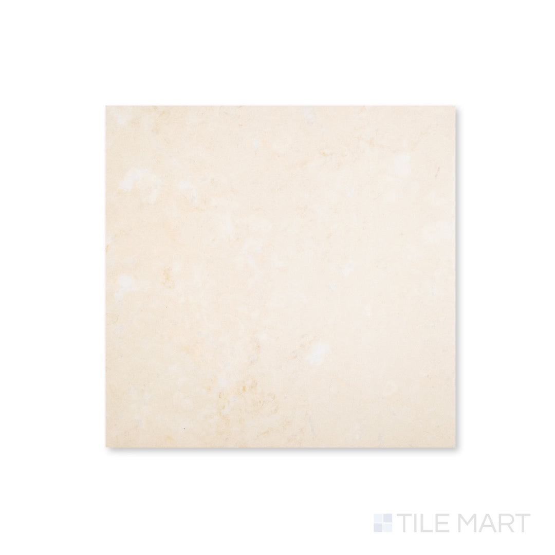 Bird's-eye view of a 12x12 Palazzo Crema polished porcelain tile in warm ivory with a lustrous glossy surface and smooth marble-like sheen