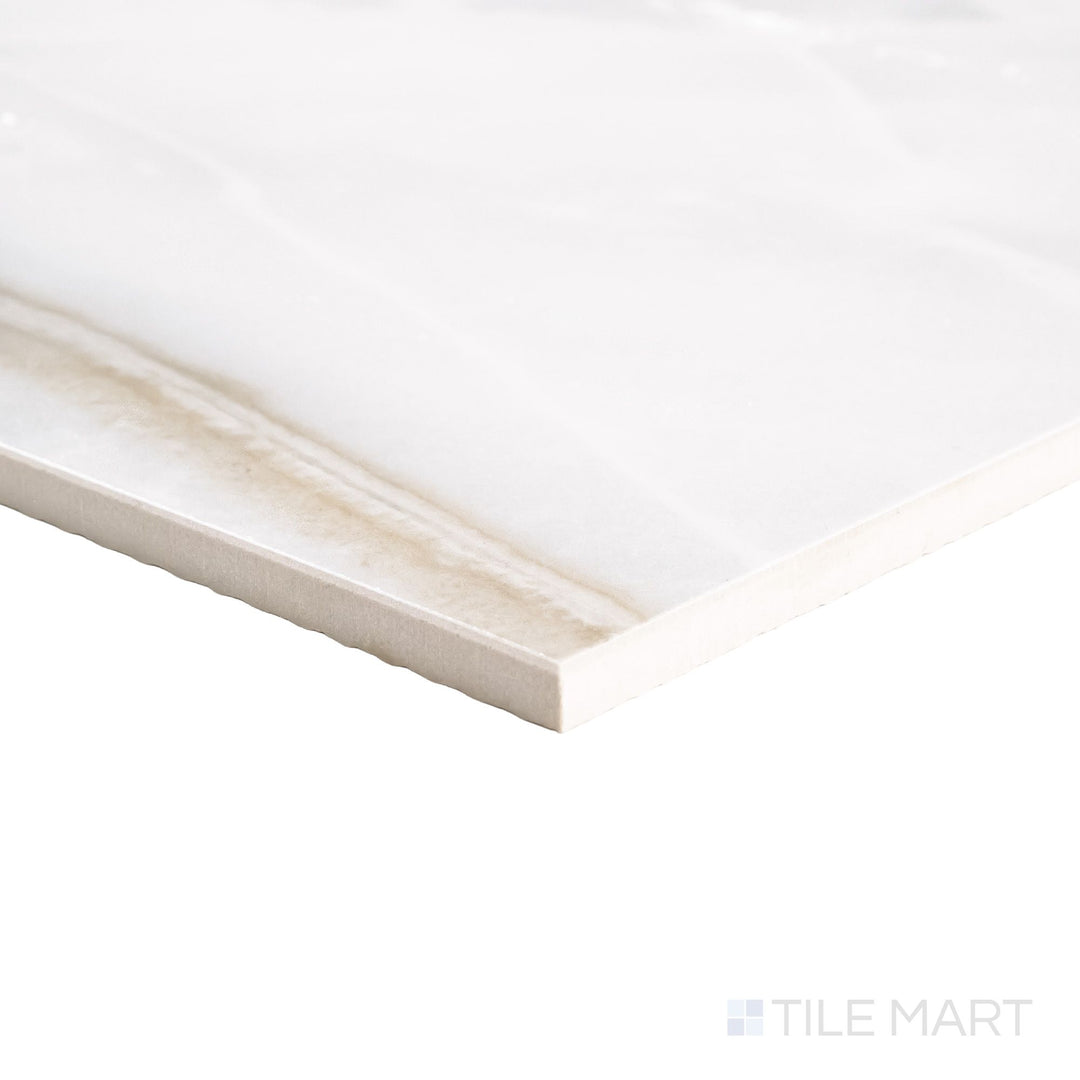 Angled corner view of a large 24x24 Palazzo Calacatta polished porcelain tile highlighting sharp edge precision and gleaming veined marble gloss surface