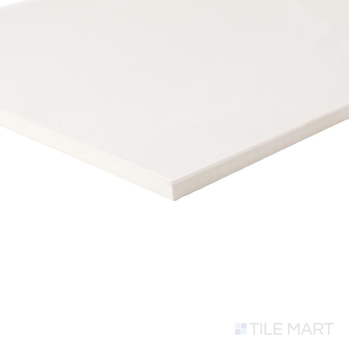 Corner shot of a large 24x24 Palazzo Luce polished porcelain tile showing its rectified edge quality and radiant high-gloss light-enhancing finish
