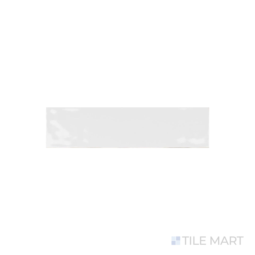 A crisp close-up of Artesano White Ice 3X12 Bright Ceramic highlights its sleek, glossy white surface, perfect for a fresh and timeless look.