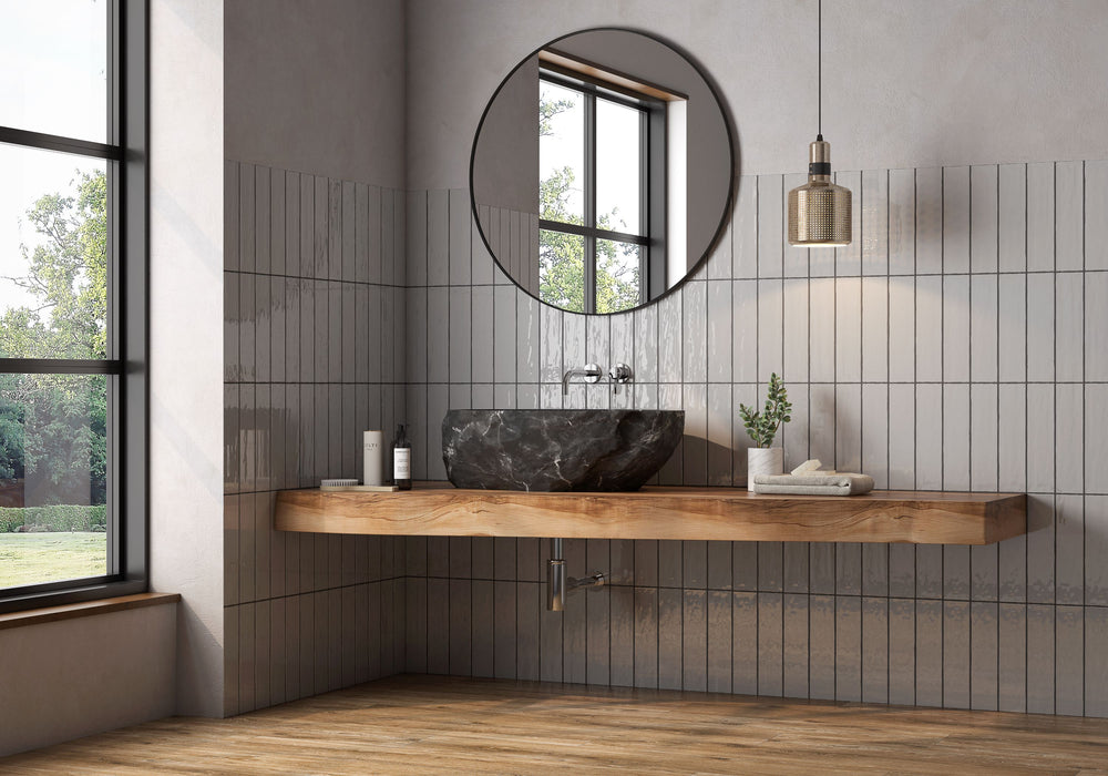 With a balanced and neutral tone, Artesano Neu Gray 3X12 bright ceramic tile creates a versatile backdrop for modern and classic interiors alike.