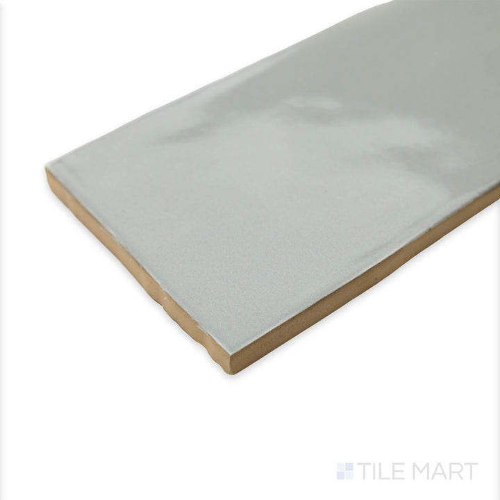 Corner shot of Bar Tile Oslo 3X12 bright ceramic, displaying its modern aesthetic, polished surface, and crisp edge alignment.