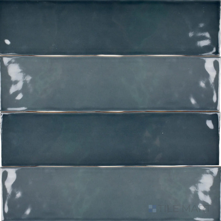 An overhead shot of the Bar Tile Havre 3x12 inch bright ceramic tile reveals its luminous glazed surface and elegant color, perfect for contemporary wall applications.