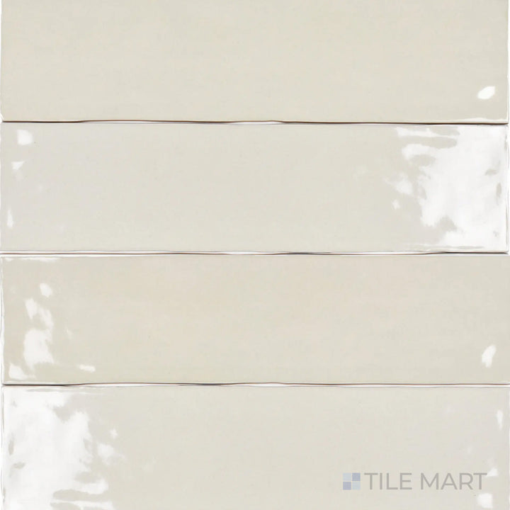 A high-angle view of the Bar Tile Nuuk 3x12 inch bright ceramic tile showcases its sleek, polished surface and rich hue, making it a striking choice for any space.