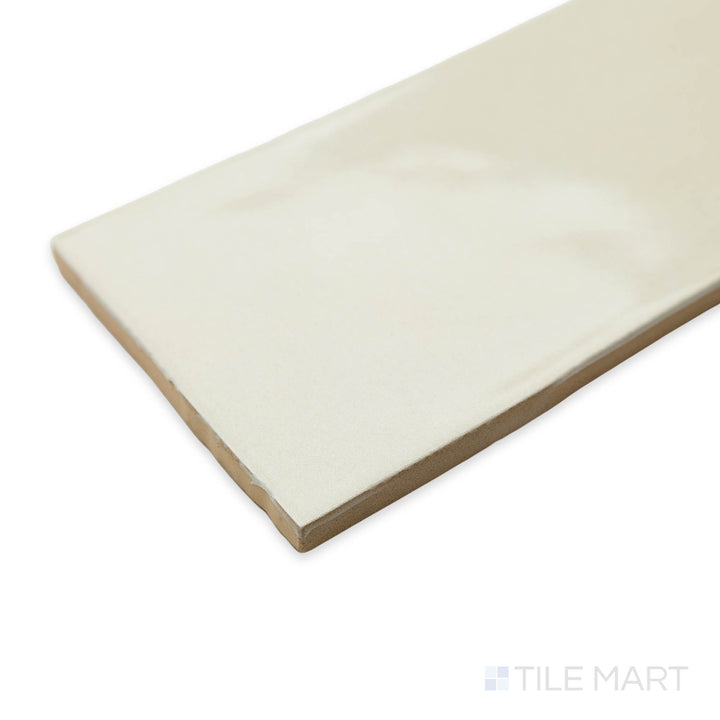 Corner-focused image of Bar Tile Nuuk 3X12 bright ceramic, showcasing its bold color, high-gloss sheen, and structured corner transition.